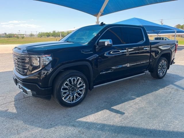 2024 GMC Sierra 1500 Denali Ultimate in Onyx Black — front three-quarter view