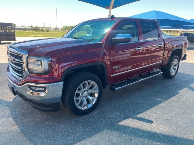 2018 GMC Sierra 1500 SLT in Red Quartz Tintcoat — front three-quarter view