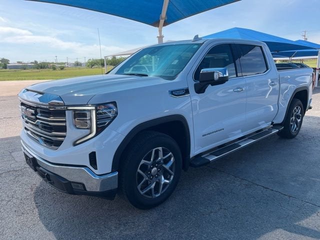 2023 GMC Sierra 1500 SLT in Summit White — front three-quarter view